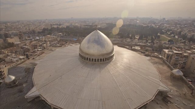 Panoramic aerial view of a sprawling city with distinctive domed architecture