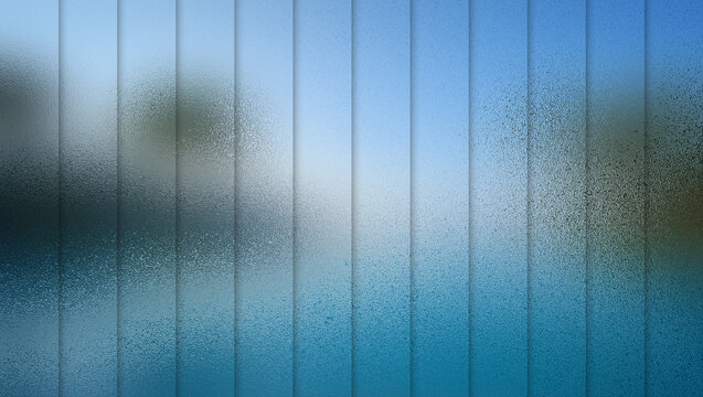 Blurry blue and white frosted glass window with vertical lines and condensation drops
