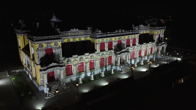 Aerial view of illuminated facade of the kien trung palace, imperial city of hue in vietnam