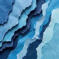 Abstract layered torn paper in shades of blue with rough edges and organic wave texture