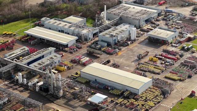 Aerial view of BOC Gases, a sprawling industrial site filled with tanks and cylinders, under the soft glow of daylight, Grimsby, United Kingdom.
