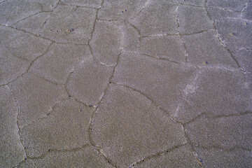 the texture of a mixture of sand, earth, clay, and snow on Lake Elton