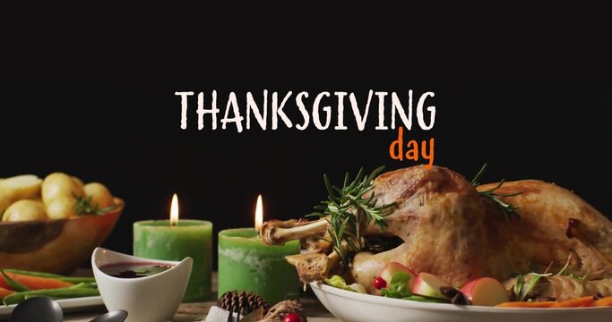 Presenting roasted turkey sitting on platter at table, with lit candles and THANKSGIVING day sign