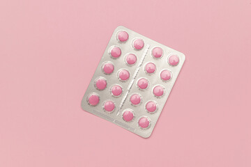 Pink Pills in Blister Pack on Pastel Background: Modern Pharmaceutical Image