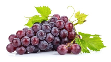Fototapeta premium Fresh red grapes with green leaves isolated on white background