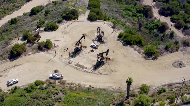 Aerial view of oil pumpjacks operating in an onshore oil field