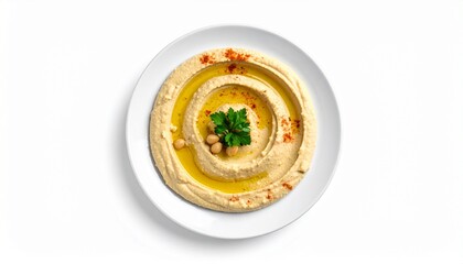 photo of hummus on a white plate on a plain white background