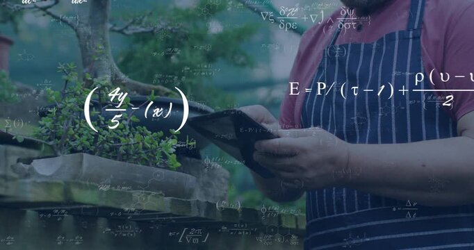 Senior man bringing handheld device near bonsai, tapping while formulas appearing, aiding science