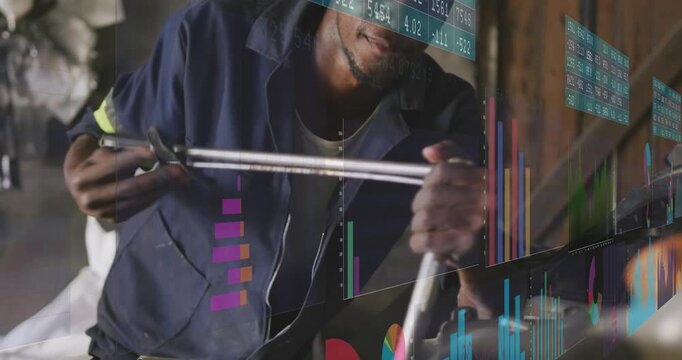 Technician responding to bar chart overlays in workshop, aligning and fastening tube for inspection