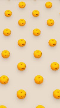 Holiday 3d render of pumpkin shapes is rotating in isometric view. Computer generated loop animation. Halloween pattern, 4K seamless vertical motion design