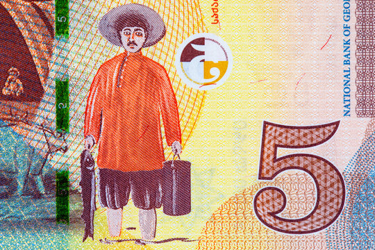 5 Georgian Lari banknote, featuring a fisherman from Niko Pirosmani painting and security elements. New money of Georgia.