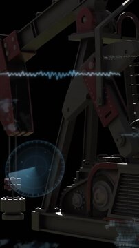 Vertical video: Camera panning right and down, oil pumpjack turning crank, HUD radar scanning data