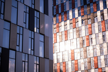 Fototapeta premium Modern architecture showing glass facades and abstract patterns on new high-rise buildings