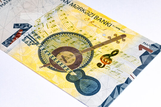 1 Manat Azerbaijan, with the image of Azerbaijani national musical instruments &ndash; Tar, Kamancha, and Daf. Money of Azerbaijan.