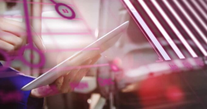 Hands tapping tablet swiping and rotating while pink overlays changing into month charts for review