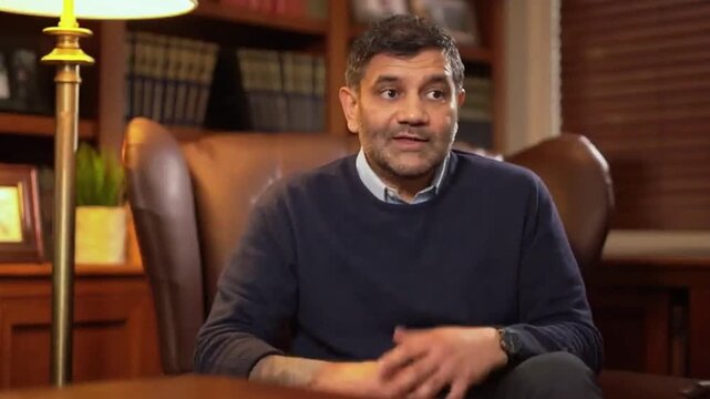 Businessman interview smiling positive guy male business coach businessman mentor influencer leader entrepreneur HR manager at office talking to camera consultation motivation speech teaching consult