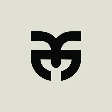 Abstract black symbol resembling a stylized face or mask