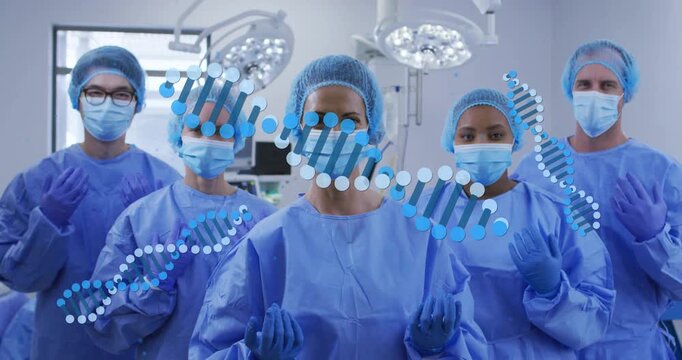 Surgical team holding gloves, DNA helix emerging left and growing across, showing medical genetics
