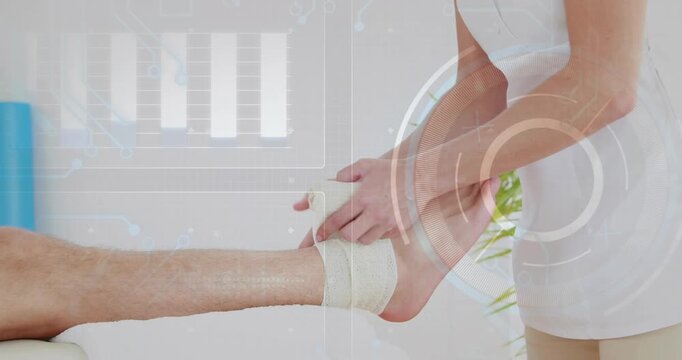 Therapist placing patient's foot, padding ankle and wrapping elastic wrap with HUD charts appearing