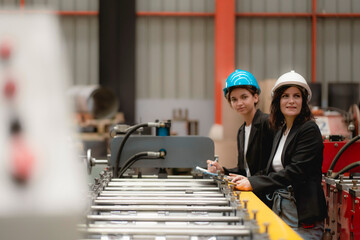 Fototapeta premium Professional engineering, worker, woman Quality control, maintenance, check in factory, warehouse Workshop for factory operators, engineering team