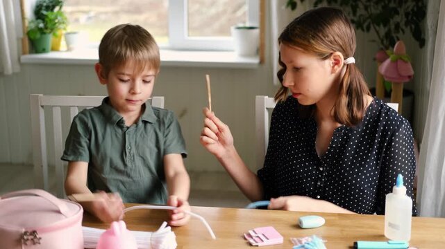 Happy Children Laugh and Fun Make DIY Toys. Kids Crafting from Fluffy wire, Bending Plush. Craft Pipe Cleaners. Leisure on Holidays. Thick Fluffy Chenille Stems for Arts. Supplies, Chenille Stems.