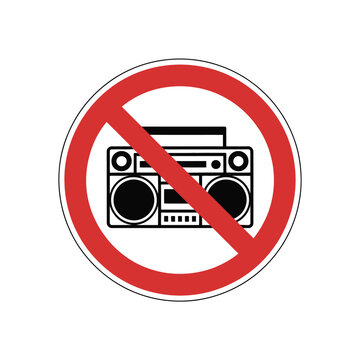 A prohibition sign warns against playing loud music on a boombox.