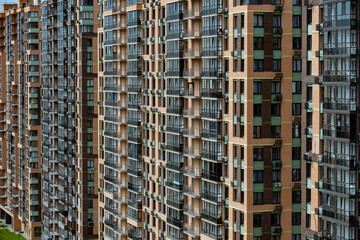 Modern urban residential high-rise buildings creating a dense city apartment complex