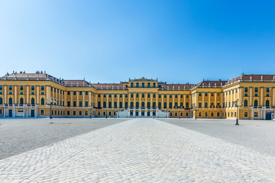 people visit Schonbrunn Palace in Vienna during sunny spring day prince garden view