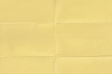 Fototapeta premium Yellow folded paper texture background with diagonal creases and crumpled aesthetic, vintage cyan paper sheet with weathered surface and organic grain for creative graphic design and scrapbooking.