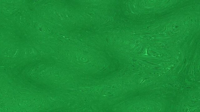 Close-up abstract green background with swirling, textured patterns resembling brushstrokes or fibers, creating a vibrant visual effect.