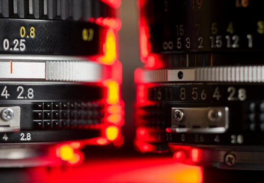 Vintage Camera Lenses with Red Glow Macro Detail