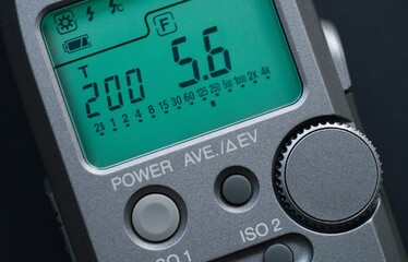 Digital Light Meter with Glowing Green LCD Display Close Up