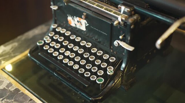 Antique cast iron typewriter with mechanical keyboard