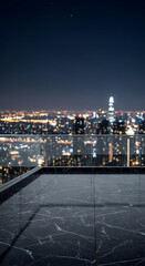Fototapeta premium Panoramic view of a sprawling city skyline at night from a high vantage point on a rooftop terrace with glass railings