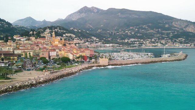Aerial view of Menton France showcasing Mediterranean coastline and historic town from above