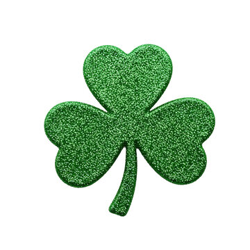A green glittery shamrock on transparent background