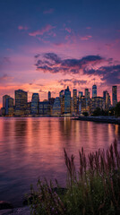 Obraz premium Panoramic view of New York City financial district skyscrapers from Brooklyn