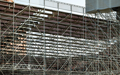 Temporary scaffolding structure building an outdoor event stadium for performances