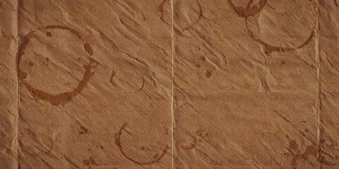 Close up of textured brown surface with circular stain patterns