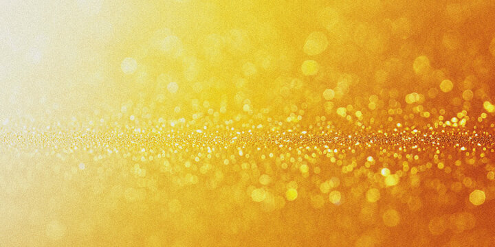 Golden abstract background with blurred bokeh and sparkling glitter effects