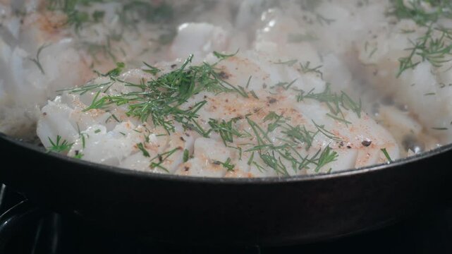 Pan searing fresh cod fillets with dill