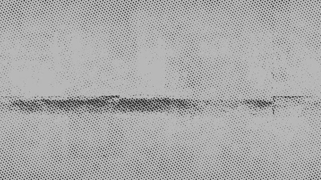 Distorted digital halftone pattern glitching and dissolving across a screen, creating abstract animated texture footage.