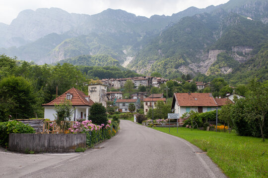 Poffabro alpine village mountain Friuli Venezia Giulia Pordenone houses terracotta roofs panoramic green valley nature tourism medieval hamlet picturesque Italian alps