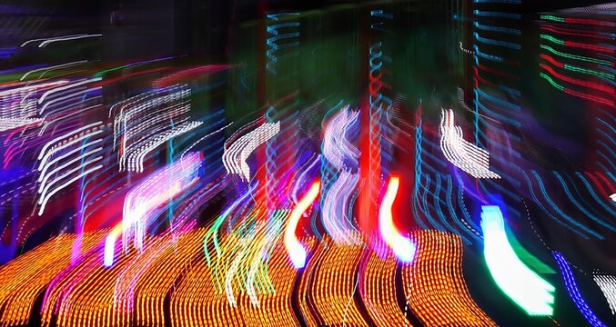 Abstract background. Linear geometric composition. Photography of night lights in motion. Selective focus. Grunge texture. Copy space.