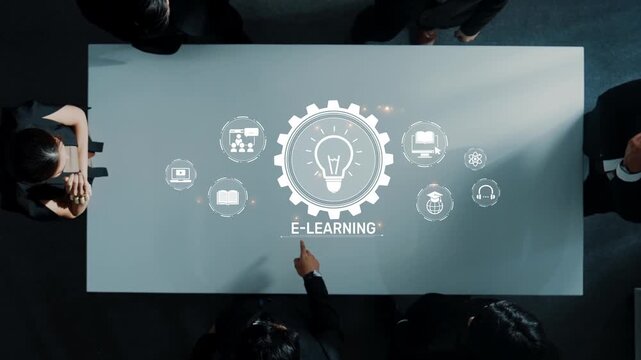 Aerial view of a business meeting focused on e-learning, showcasing digital icons that represent various aspects of online education in a modern workspace setting. Raster