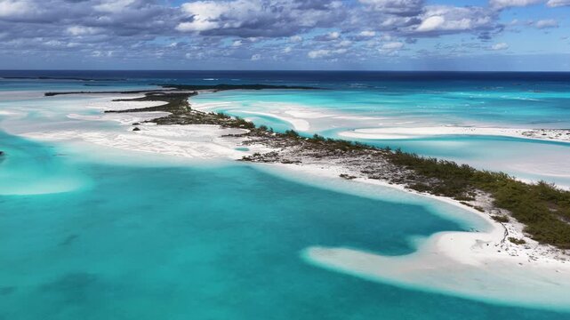 Aerial view of Man-O-War Cay in Moriah Harbour Cay National Park showing the island and sandbars in the Exumas, Bahamas.
