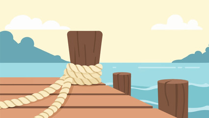 Fototapeta premium Wooden pier posts with rope and calm blue water under a pale sky