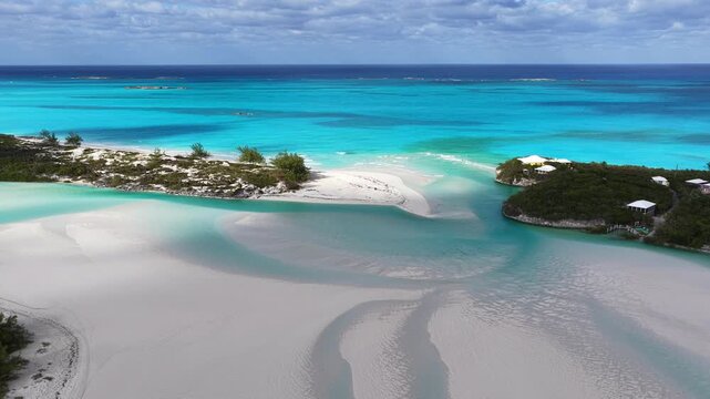 Aerial view of a tour boat at The Cut, also known as the Lazy River, a natural feature that flows with the tide either in from the ocean or out towards the ocean.