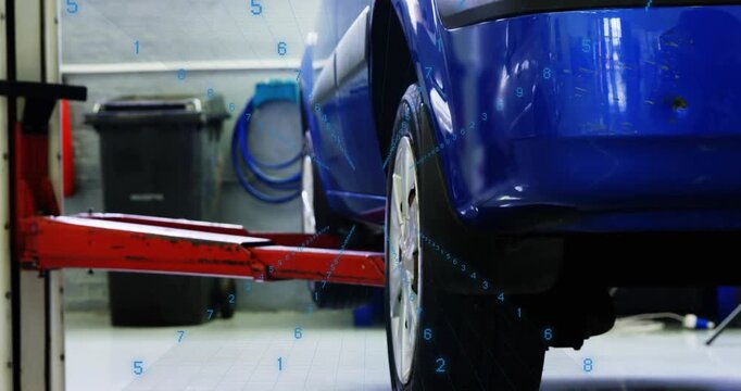 Red hydraulic lift arm contacting jacking point and raising blue hatchback to expose underside