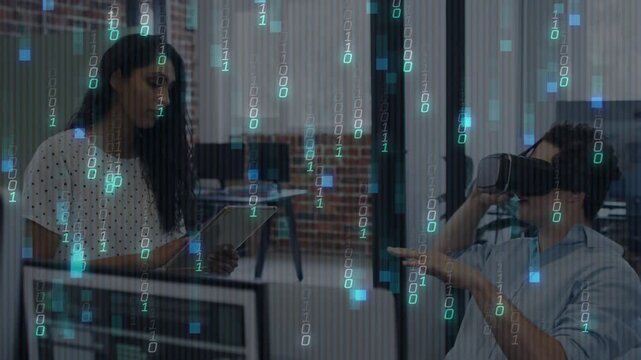 Woman monitoring tablet, tester donning VR headset and navigating UI, binary overlaying tech demo